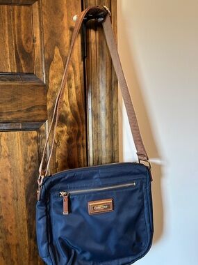 Calvin Klein Navy Messenger Bag with Brown Strap